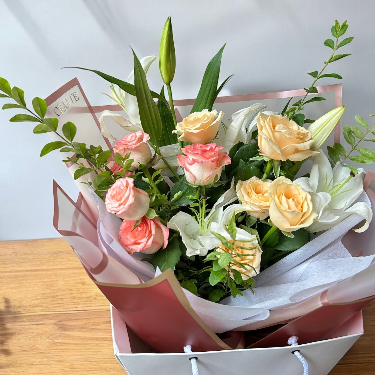 Bouquet in White Flower Bag