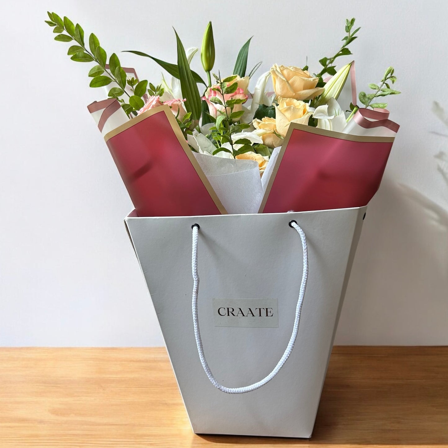 Bouquet in White Flower Bag